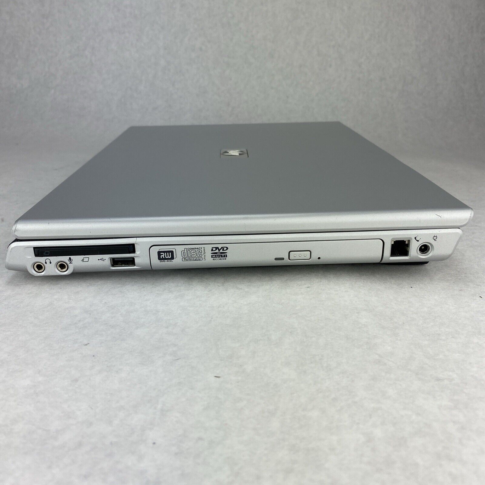 Vintage HP Pavilion dv5000 15.4" AMD Turion 64 1.80GHz 1GB RAM No AC HDD OS