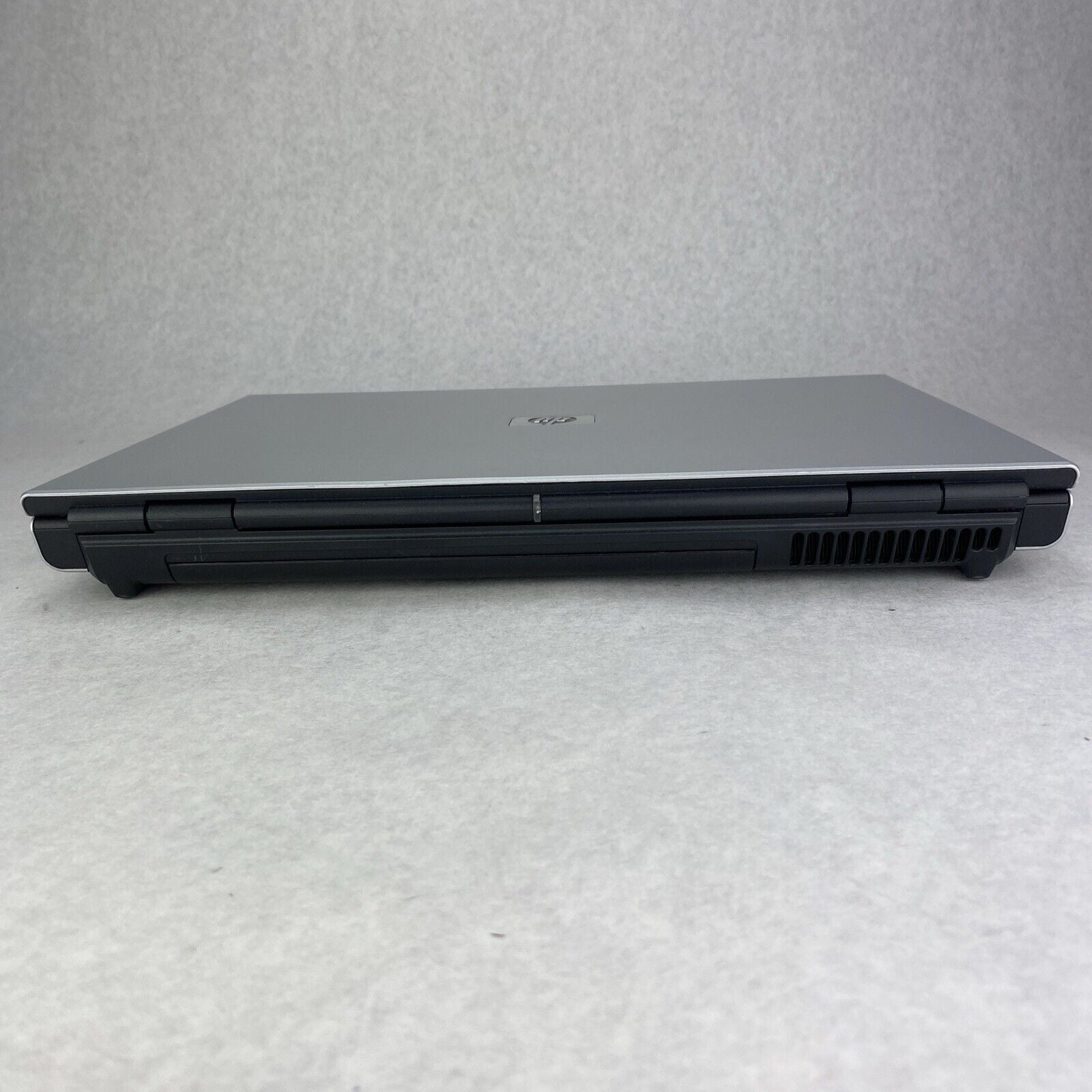 Vintage HP Pavilion dv5000 15.4" AMD Turion 64 1.80GHz 1GB RAM No AC HDD OS